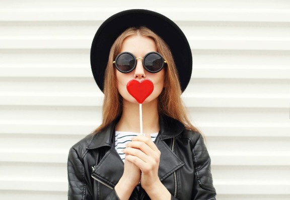 Gently round your lips